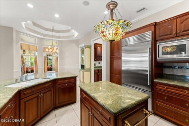 Welcome to this exquisite custom-built home located in the on Plantation Bay Golf and Country Club in Florida - for sale on GolfHomes.com, golf home, golf lot