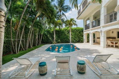 Grand 3-story gated home on prestigious lower North Bay Road on Miami Beach Golf Club in Florida - for sale on GolfHomes.com, golf home, golf lot