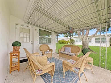 Check out this charming 2 bedroom, 1 bath and 1 car attached on Mainlands Golf Club in Florida - for sale on GolfHomes.com, golf home, golf lot