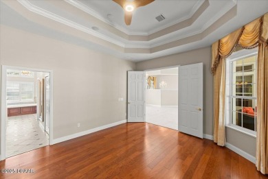 Welcome to this exquisite custom-built home located in the on Plantation Bay Golf and Country Club in Florida - for sale on GolfHomes.com, golf home, golf lot