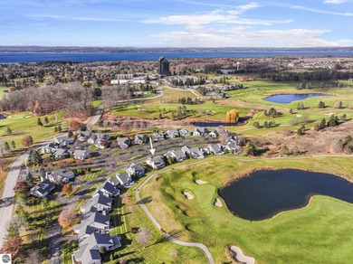 Experience affordable luxury overlooking the 15th hole of The on Grand Traverse Resort and Spa in Michigan - for sale on GolfHomes.com, golf home, golf lot