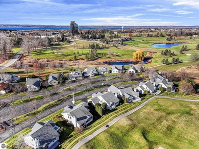 Experience affordable luxury overlooking the 15th hole of The on Grand Traverse Resort and Spa in Michigan - for sale on GolfHomes.com, golf home, golf lot