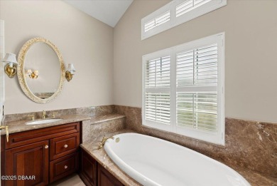 Welcome to this exquisite custom-built home located in the on Plantation Bay Golf and Country Club in Florida - for sale on GolfHomes.com, golf home, golf lot