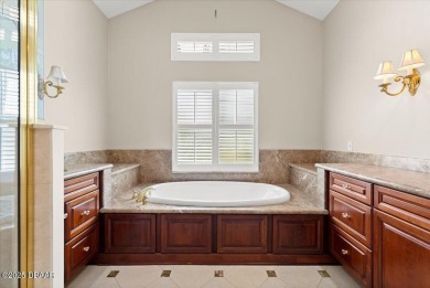 Welcome to this exquisite custom-built home located in the on Plantation Bay Golf and Country Club in Florida - for sale on GolfHomes.com, golf home, golf lot