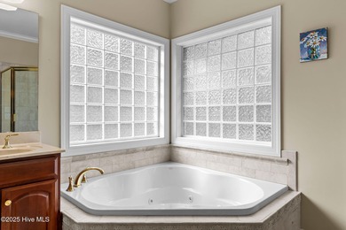 Welcome to 305 Tall Ships Lane-an impeccably maintained brick on Belvedere Country Club in North Carolina - for sale on GolfHomes.com, golf home, golf lot