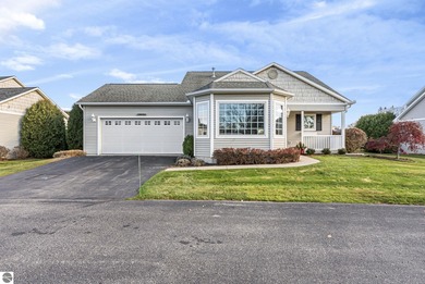 Experience affordable luxury overlooking the 15th hole of The on Grand Traverse Resort and Spa in Michigan - for sale on GolfHomes.com, golf home, golf lot
