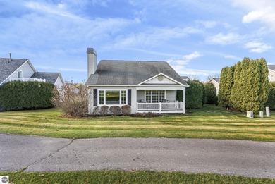 Experience affordable luxury overlooking the 15th hole of The on Grand Traverse Resort and Spa in Michigan - for sale on GolfHomes.com, golf home, golf lot