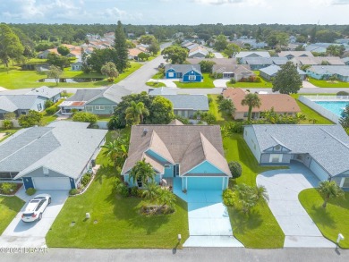 Available now, this beautiful Fairgreen golf community home just on Hidden Lakes Golf Club in Florida - for sale on GolfHomes.com, golf home, golf lot