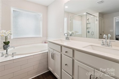 This beautifully designed 3-story home is ideal for entertaining on Fox Den Country Club in North Carolina - for sale on GolfHomes.com, golf home, golf lot
