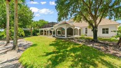 Welcome to this exquisite custom-built home located in the on Plantation Bay Golf and Country Club in Florida - for sale on GolfHomes.com, golf home, golf lot