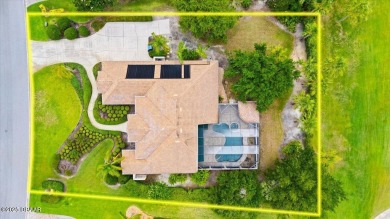 Welcome to this exquisite custom-built home located in the on Plantation Bay Golf and Country Club in Florida - for sale on GolfHomes.com, golf home, golf lot
