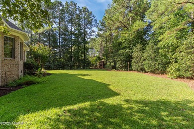 Welcome to 305 Tall Ships Lane-an impeccably maintained brick on Belvedere Country Club in North Carolina - for sale on GolfHomes.com, golf home, golf lot