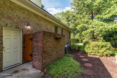 Welcome to 305 Tall Ships Lane-an impeccably maintained brick on Belvedere Country Club in North Carolina - for sale on GolfHomes.com, golf home, golf lot