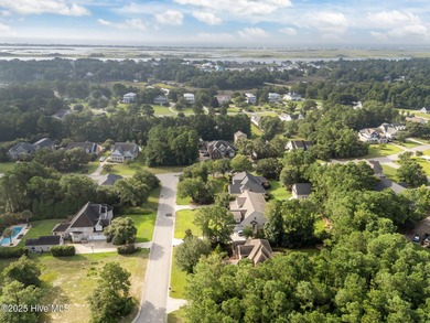 Welcome to 305 Tall Ships Lane-an impeccably maintained brick on Belvedere Country Club in North Carolina - for sale on GolfHomes.com, golf home, golf lot