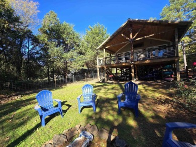 Cozy cabin for the perfect weekend retreat on Greers Ferry Lake on Tannenbaum Golf Club in Arkansas - for sale on GolfHomes.com, golf home, golf lot