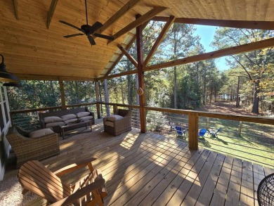 Cozy cabin for the perfect weekend retreat on Greers Ferry Lake on Tannenbaum Golf Club in Arkansas - for sale on GolfHomes.com, golf home, golf lot