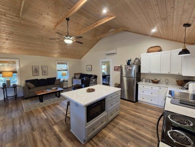 Cozy cabin for the perfect weekend retreat on Greers Ferry Lake on Tannenbaum Golf Club in Arkansas - for sale on GolfHomes.com, golf home, golf lot