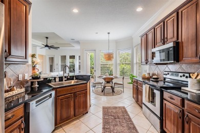 Stop scrolling--this is the one. Tucked inside one of on Westchase Golf Club in Florida - for sale on GolfHomes.com, golf home, golf lot