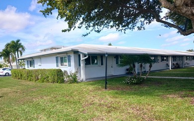 Fall in love with this 2Br/2Ba corner villa is ideally located on Leisureville Community Golf Course in Florida - for sale on GolfHomes.com, golf home, golf lot