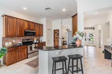 Stop scrolling--this is the one. Tucked inside one of on Westchase Golf Club in Florida - for sale on GolfHomes.com, golf home, golf lot