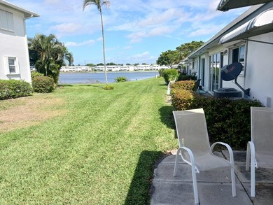 Fall in love with this 2Br/2Ba corner villa is ideally located on Leisureville Community Golf Course in Florida - for sale on GolfHomes.com, golf home, golf lot