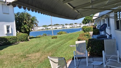 Fall in love with this 2Br/2Ba corner villa is ideally located on Leisureville Community Golf Course in Florida - for sale on GolfHomes.com, golf home, golf lot