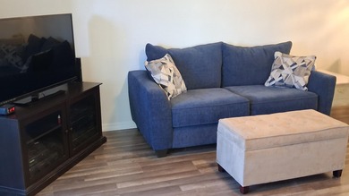 Fall in love with this 2Br/2Ba corner villa is ideally located on Leisureville Community Golf Course in Florida - for sale on GolfHomes.com, golf home, golf lot