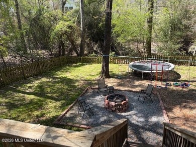 Charming 4-bedroom, 2-bath, two-story home offering over 2,000 on Diamondhead Country Club in Mississippi - for sale on GolfHomes.com, golf home, golf lot