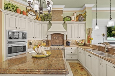 Gorgeous Custom Home on .55 Acre lot at ''PGA Village'' with on The Legacy Golf and Tennis Club in Florida - for sale on GolfHomes.com, golf home, golf lot