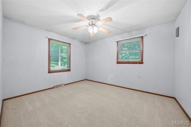 Discover the perfect blend of privacy, nature, and convenience on Incline Village Golf Course in Missouri - for sale on GolfHomes.com, golf home, golf lot