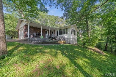 Discover the perfect blend of privacy, nature, and convenience on Incline Village Golf Course in Missouri - for sale on GolfHomes.com, golf home, golf lot