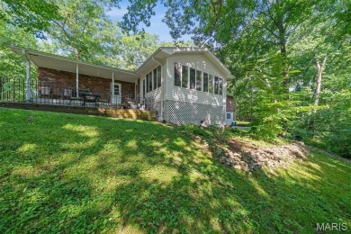 Discover the perfect blend of privacy, nature, and convenience on Incline Village Golf Course in Missouri - for sale on GolfHomes.com, golf home, golf lot