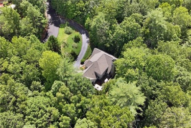 Located in the desirable gated Innsbruck Golf  Resort community on Innsbruck Resort and Golf Club in Georgia - for sale on GolfHomes.com, golf home, golf lot