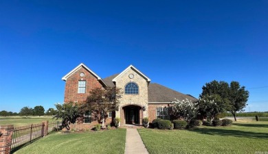 Welcome to 1715 Club Cove, a stunning custom-built home in on Stuttgart Country Club in Arkansas - for sale on GolfHomes.com, golf home, golf lot