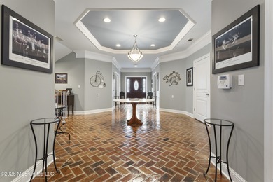 Welcome to this exceptional 4-bedroom, 5-bath custom waterfront on Sunkist Country Club, Inc. in Mississippi - for sale on GolfHomes.com, golf home, golf lot