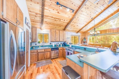 Enchanting Chalet Retreat in Lake Almanor Country Club. Discover on Lake Almanor Country Club in California - for sale on GolfHomes.com, golf home, golf lot