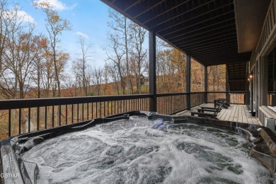 This brand-new construction, 4 BR, 5 BA pool cabin has recently on Bent Creek Golf Course in Tennessee - for sale on GolfHomes.com, golf home, golf lot