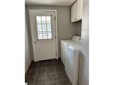 This is a HUD home case number 263-394164. Owner occupied bids on White Deer Country Club in Michigan - for sale on GolfHomes.com, golf home, golf lot