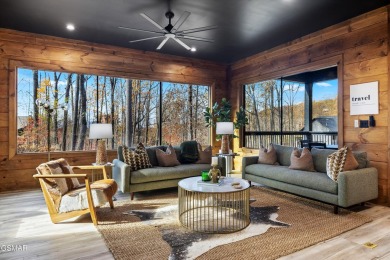 This brand-new construction, 2 BR, 4 BA, pool cabin has recently on Bent Creek Golf Course in Tennessee - for sale on GolfHomes.com, golf home, golf lot