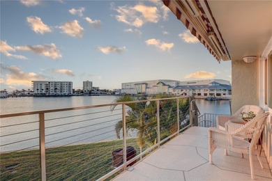 WATERFRONT PARADISE IN DUNEDIN! Beautifully updated two-level on The Dunedin Country Club in Florida - for sale on GolfHomes.com, golf home, golf lot