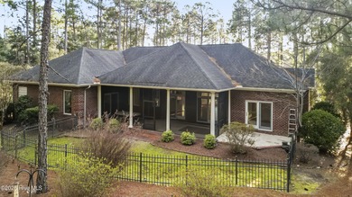 Welcome to this beautifully crafted single-story brick home in on Mid South Club in North Carolina - for sale on GolfHomes.com, golf home, golf lot