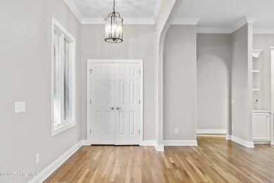 Welcome to this beautifully crafted single-story brick home in on Mid South Club in North Carolina - for sale on GolfHomes.com, golf home, golf lot