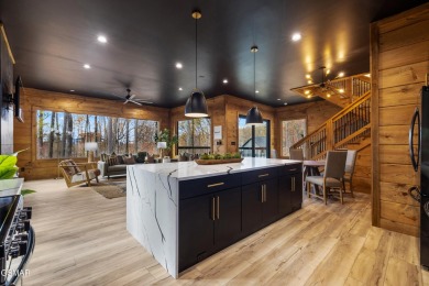 This brand-new construction, 2 BR, 4 BA, pool cabin has recently on Bent Creek Golf Course in Tennessee - for sale on GolfHomes.com, golf home, golf lot