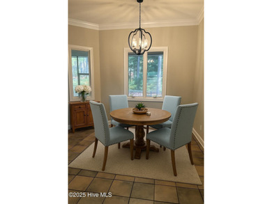 Welcome to this beautifully crafted single-story brick home in on Mid South Club in North Carolina - for sale on GolfHomes.com, golf home, golf lot