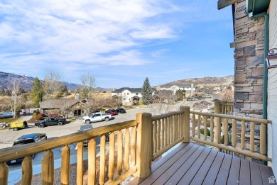 Welcome to this charming turn-key two-bedroom condo in a on Wolf Creek Golf Club and Resort in Utah - for sale on GolfHomes.com, golf home, golf lot