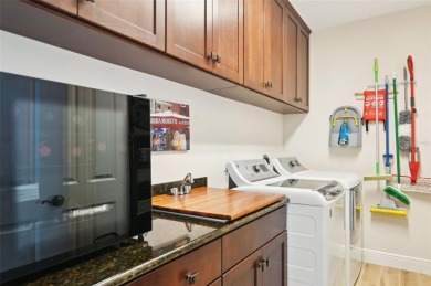Stunning Lakefront Luxury Condo at Waterfront at Main Street on Legacy Golf Club in Florida - for sale on GolfHomes.com, golf home, golf lot