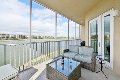 Stunning Lakefront Luxury Condo at Waterfront at Main Street on Legacy Golf Club in Florida - for sale on GolfHomes.com, golf home, golf lot