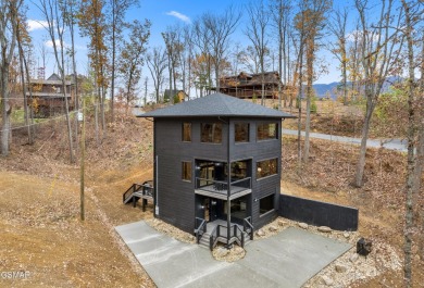 This brand-new construction, 2 BR, 4 BA, pool cabin has recently on Bent Creek Golf Course in Tennessee - for sale on GolfHomes.com, golf home, golf lot