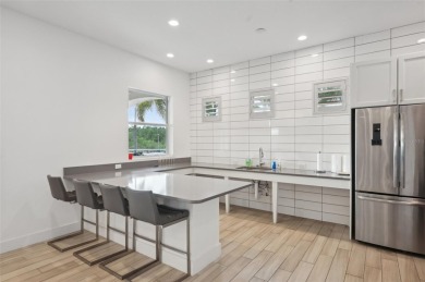 Stunning Lakefront Luxury Condo at Waterfront at Main Street on Legacy Golf Club in Florida - for sale on GolfHomes.com, golf home, golf lot