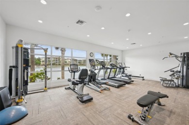Stunning Lakefront Luxury Condo at Waterfront at Main Street on Legacy Golf Club in Florida - for sale on GolfHomes.com, golf home, golf lot